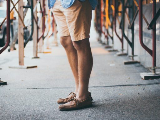 person standing on road