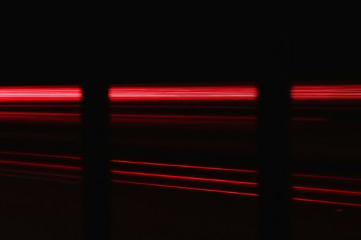 a blurry photo of a red light in the dark