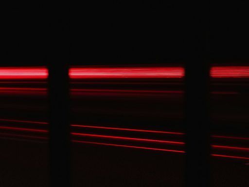 a blurry photo of a red light in the dark